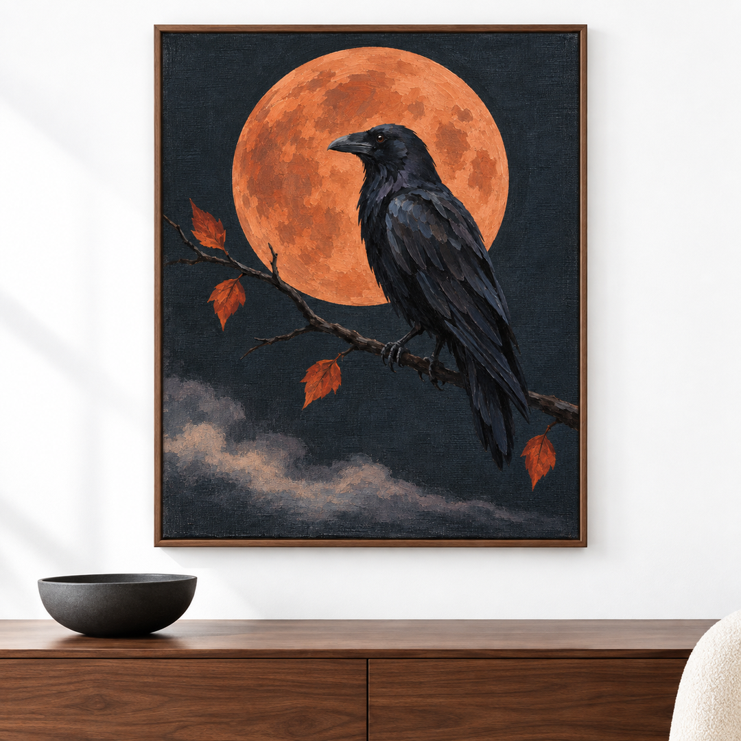 Cuervo y luna terracota — el cuadro terminado colgado en la pared